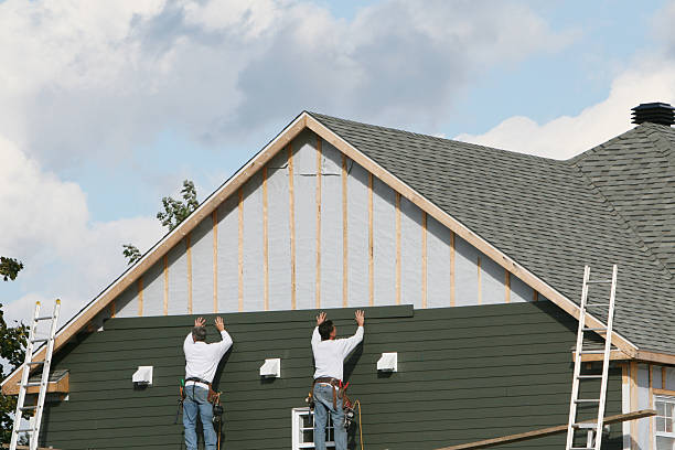 Professional Siding Installation technician working in Scotland, MD